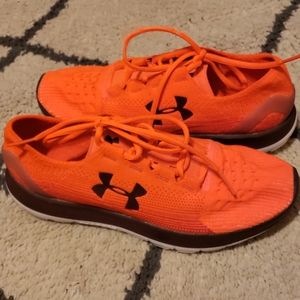 Orange Under Armour sneakers
